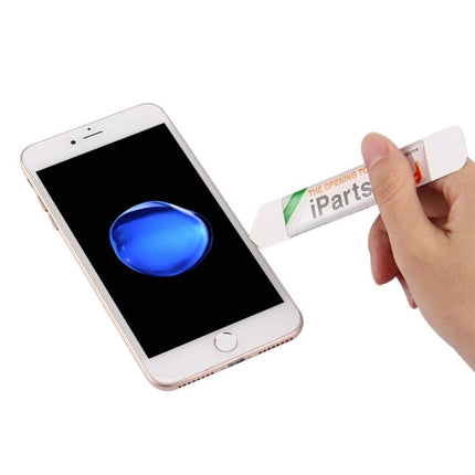 iPartsBuy Flexible Blade Tool for Smartphone Screen Repair being used to gently pry open a smartphone for screen repair