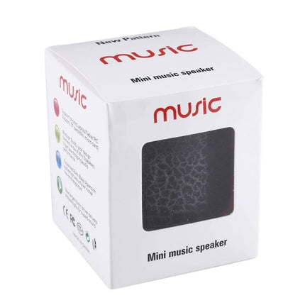 Compact Bedside Speaker With Ambient Night Light For Hands Free Calls in white retail box showing mini music speaker