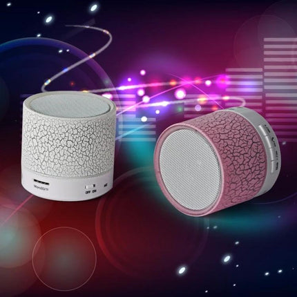 Compact Bedside Speaker With Ambient Night Light For Hands Free Calls white and pink textured tabletop speaker set