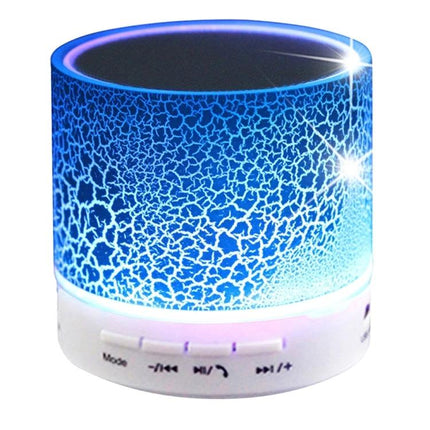 Compact Bedside Speaker With Ambient Night Light For Hands Free Calls blue crackle LED lamp and speaker on bedside table