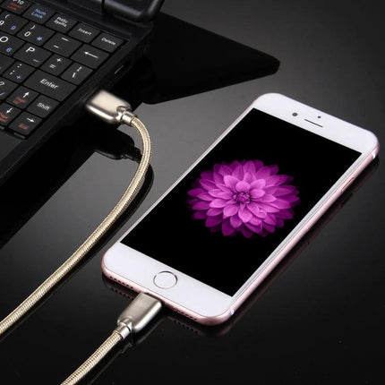 A Practical Cable for Daily iPhone and iPad Charging connecting an iPhone to a laptop with a woven gold 8-pin charging and data cable