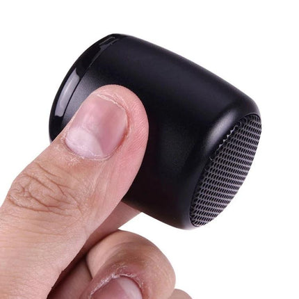 Compact Bluetooth Speaker For Music And Hands Free Calls in-hand portable black mini speaker for walks calls and music playback