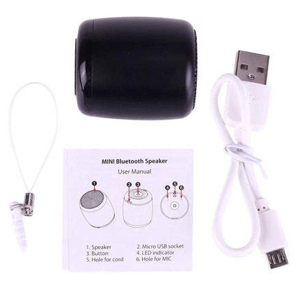 Compact Bluetooth Speaker For Music And Hands Free Calls small black speaker with USB cable, strap and user manual for portable use