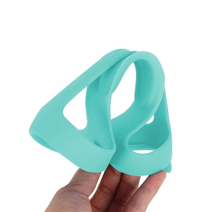 Alt Tag: JBL Silicone Speaker Cover With Carabiner Strap For Travel in teal silicone held for portable outdoor protection
