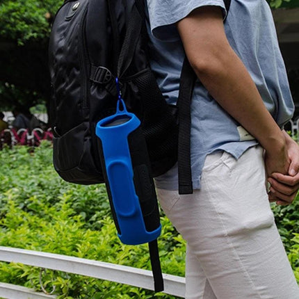 JBL Silicone Speaker Cover With Carabiner Strap For Travel clipped to backpack for hands-free outdoor protection