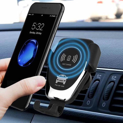 Wireless Charging Car Phone Holder with Gravity Induction mounted on car vent showing phone being placed for fast wireless charging