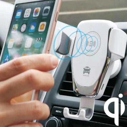 Wireless Charging Car Phone Holder with Gravity Induction mounted on car vent charging smartphone hands-free