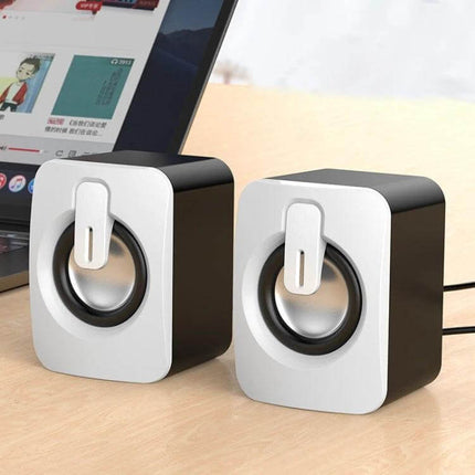 Compact Bluetooth USB Speaker For Desk Bedside Travel compact mini USB speakers on desk next to laptop for music