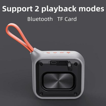 XDOBO Compact Bluetooth Speaker With Silicone Lanyard showing TF card slot, controls, orange lanyard and rugged IPX7 design