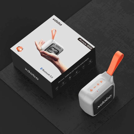 XDOBO Compact Bluetooth Speaker With Silicone Lanyard in white with orange lanyard, IPX7 portable outdoor travel speaker