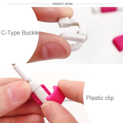 A Compact Organizer for Daily Earphone Cable Protection showing C-type buckle and pink plastic clip held between fingers