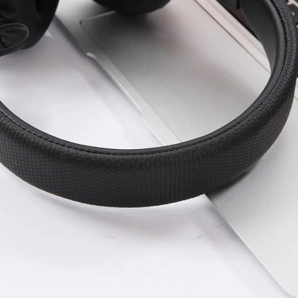 Jieli Wireless Bluetooth Headset For Commuting And Calls black over-ear headband detail on laptop for commute gym desk use