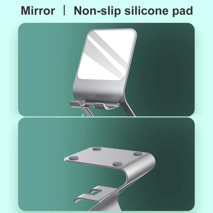 Metal Desktop Stand for Phones, Tablets and Makeup Mirror showing metal adjustable holder with built-in mirror and non-slip silicone pads