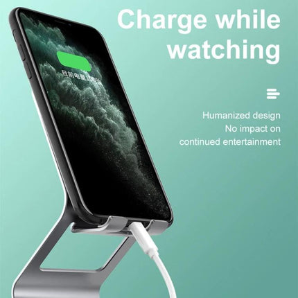 Metal Desktop Stand for Phones, Tablets and Makeup Mirror holding a charging phone at optimal viewing angle, stable metal bracket for video calls and makeup