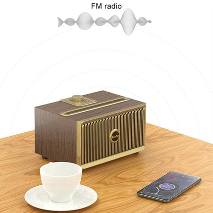 Oneder Portable Bluetooth Speaker For Travel And Daily Use compact retro FM radio speaker on table with phone and coffee