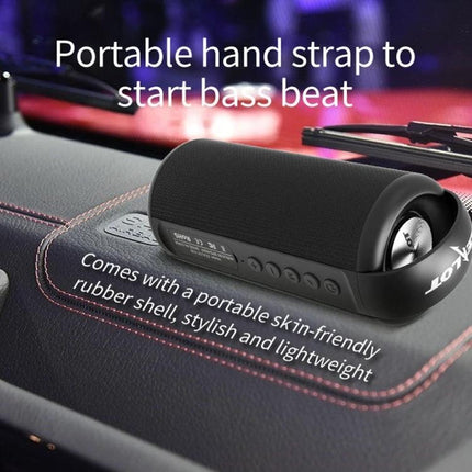 Zealot Compact Bluetooth Speaker With Carry Handle For Travel shown on car dash with portable strap and rubber shell