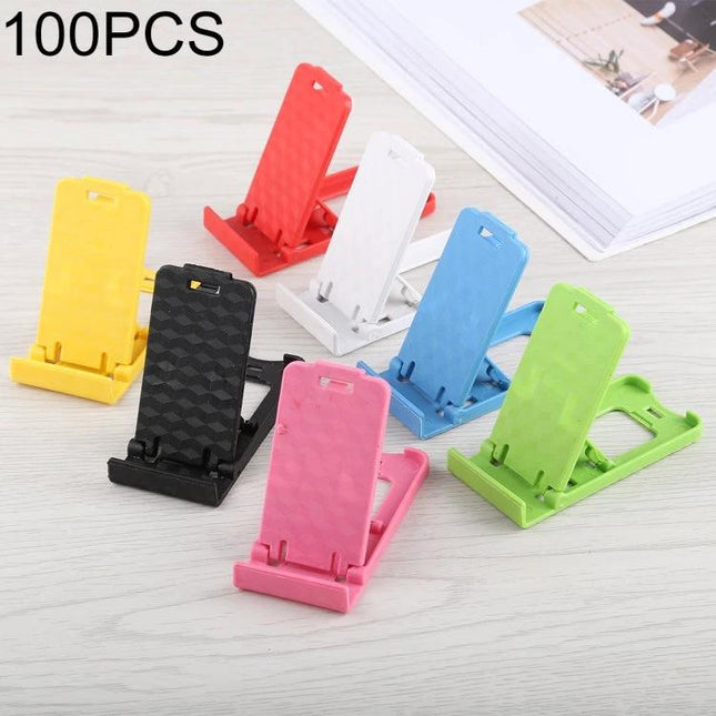 Portable Adjustable Stand for Smartphones and Tablets in assorted colors on a desk showing multiple adjustable angle positions