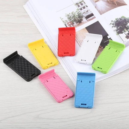 Portable Adjustable Stand for Smartphones and Tablets in assorted colors displayed on a desk for video calls, streaming, and typing