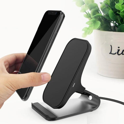 HAMTOD Charger for Daily Phone Use at Home and Travel on a desk stand showing hands‑free wireless charging for travel and home use