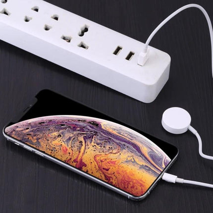 Magnetic Cable for Everyday iPhone and Apple Watch Charging showing iPhone and Apple Watch magnetic charger plugged into power strip