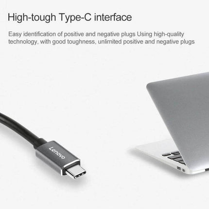 Lenovo USB-C to HDMI and VGA Adapter for Displays showing Type-C cable connector near laptop for external monitors and presentations