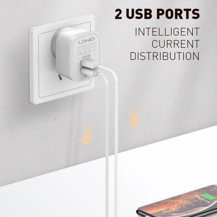Keep Your Devices Charged During Daily Travels With LDNIO Charger - compact white wall charger with 2 USB ports powering phone