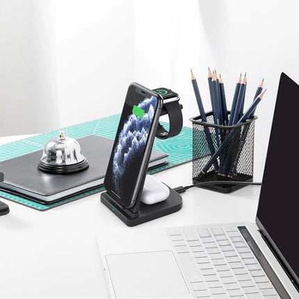 Essential charging solution for daily Apple device needs at home - 3-in-1 charging station powering iPhone, Apple Watch, and headphones on a tidy desk