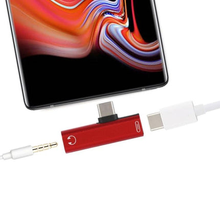 Compact Adapter for Everyday Phone Charging and Audio - red Type-C dongle enabling simultaneous charging and 3.5mm audio on the go