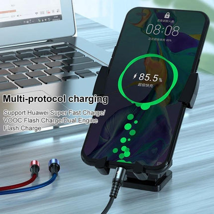 K061 Versatile 3-in-1 Cable for Daily Device Charging Needs shown charging smartphone on stand with laptop in background