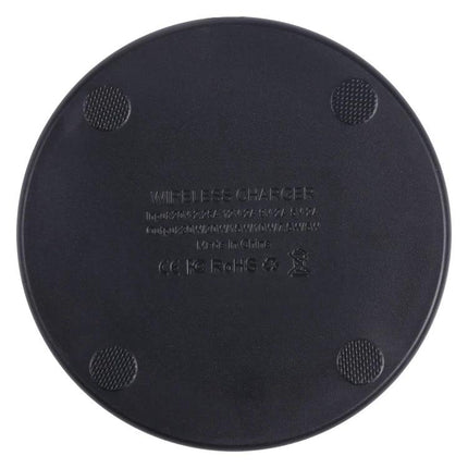 Wireless Charger for Everyday Phone Use in the Car round black Qi wireless charging pad mounted in vehicle for commute-ready power