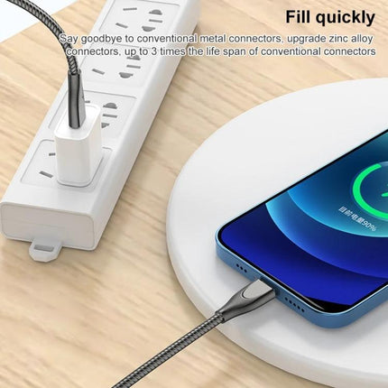 Durable USB-C to Lightning Cable for Everyday Device Charging showing braided cable charging an iPhone from power strip and wireless pad