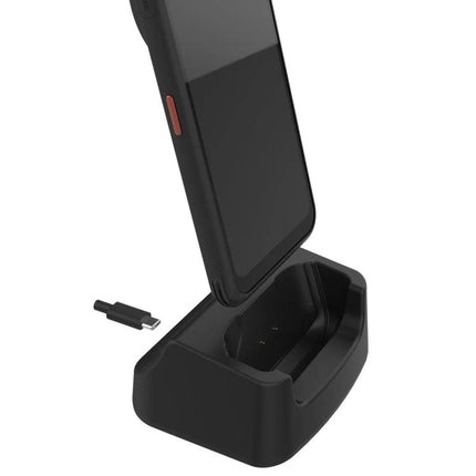 Charge Your AGM Glory G1 on the Desk with This Stand showing device upright on a black desk charging dock
