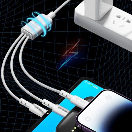 WEKOME Versatile Cable For Daily Device Charging And Travel three-in-one 1.2m PVC charging cable powering three smartphones from a wall plug