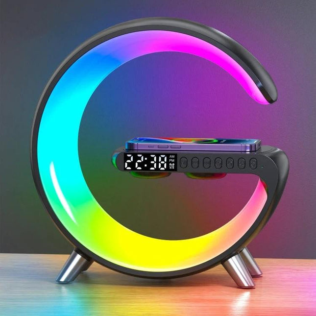 Bluetooth Bedside Speaker With Sunrise Light And Charger on nightstand showing colorful sunrise lamp, alarm clock display and wireless charging