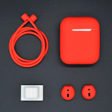 Silicone Case Set for Securing Earphones in Daily Life red silicone earphone case set laid out on dark background