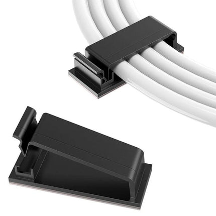 Cable Clips for Organizing Desk Cables in Daily Workspaces – black plastic clip securing multiple white cables on a desk