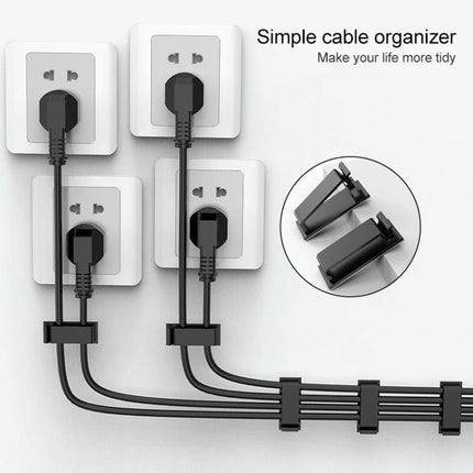 Cable Clips for Organizing Desk Cables in Daily Workspaces — black plastic clips securing power cords and chargers along a desk