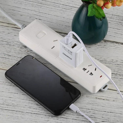 Charging Cable for Everyday Device Use at Home or On the Go - 8-pin phone charging cable plugged into power strip charging smartphone