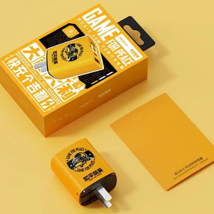 Rock Travel Charger for Everyday and Travel Device Use shown as compact yellow dual-port charger with packaging