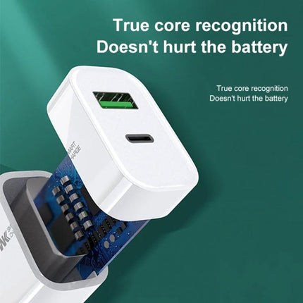 A Portable USB-C Charger for Your Everyday Device Needs compact white charger showing USB-A and USB-C ports with circuit interior and text about battery safety