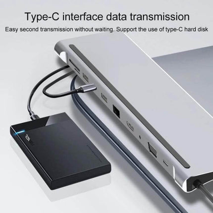 11-in-1 Type-C Hub Adapter for Device Connectivity showing aluminum hub connected to laptop with external drive and multiple peripherals