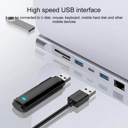 11-in-1 Type-C Hub Adapter for Device Connectivity showing aluminum USB-C hub with multiple USB ports, SD slot and connected flash drives