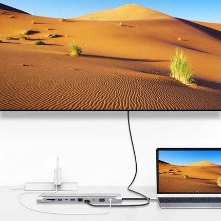 11-in-1 Type-C Hub Adapter for Device Connectivity showing laptop connected to large display and multiple peripherals, aluminum alloy hub close-up