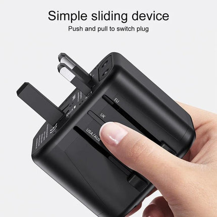 USAMS Universal Multi-Plug Travel Charger for Global Use showing a hand sliding interchangeable UK/EU/US plugs on a compact black travel adapter