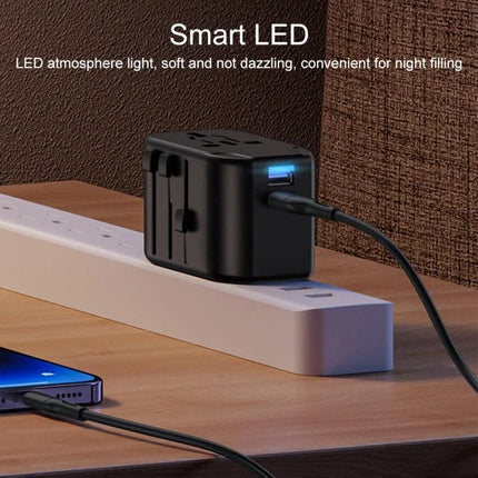 USAMS Universal Multi-Plug Travel Charger for Global Use shown plugged into power strip with LED USB port and smartphone charging