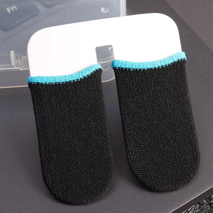 Comfortable Finger Covers for Everyday Touchscreen Tasks - black conductive carbon fiber finger sleeves with blue trim on a laptop