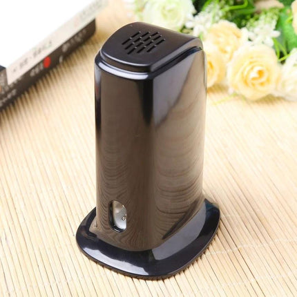 Efficient Multi-Port USB Charger for Daily Device Needs black vertical multi-port USB charger on desk for phone tablet earbuds
