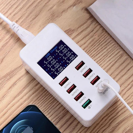 A8 USB Charging Station for Daily Home Device Needs shown on wood desk with eight USB ports, charging smartphone and displaying power readings