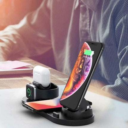 Compact Home Charger for Daily Device Powering and Use showing 6-in-1 wireless stand charging phone, earbuds and smartwatch on a desk