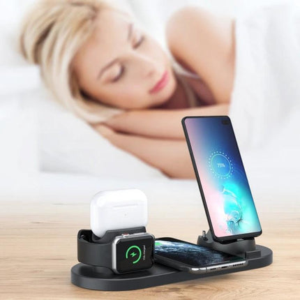 Compact Home Charger for Daily Device Powering and Use charging phone, smartwatch, and earbuds on a 6-in-1 wireless stand on bedside table